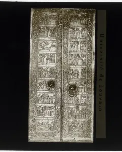 Gniezno Doors with bronze relief panels and circular door knockers