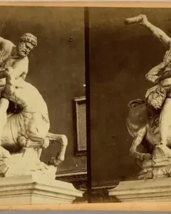 Heracles and Nessus marble sculpture showing a muscular man wrestling a centaur with a club raised overhead