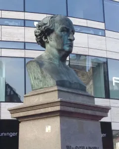 The Schadow Monument, a weathered bronze bust of W. v. Schadow on a tiered stone pedestal.