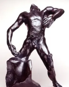 The Falling Man bronze sculpture showing a male figure arching backward on a block-like base.