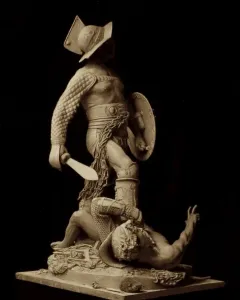 The Gladiators sculpture showing an armored fighter standing over a defeated opponent on the ground.