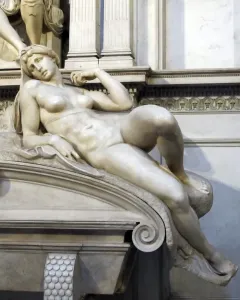 Dawn, a white marble sculpture of a reclining nude woman resting on her bent arm.