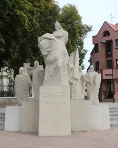 Bolesław III Wrymouth Monument in Płock, showing a mounted central figure with smaller figures on a stone base.