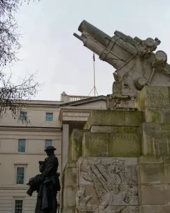Royal Artillery Memorial with a howitzer on top and a bronze soldier figure at the base.