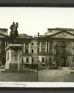 Monument to Peter I on a tall stone pedestal in front of St. Michael\'s Castle in Saint Petersburg.