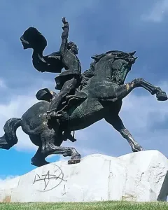Suvorov Monument depicting a bronze equestrian statue of a man on a rearing horse with one arm raised.