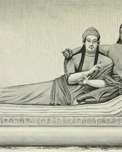 Sarcophagus of the Spouses showing a smiling man and woman reclining together on a banqueting couch.