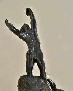 The Prodigal Son by Auguste Rodin, a bronze sculpture of a kneeling nude man with arms raised and head thrown back.