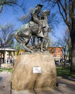 Buckey O\'Neill Monument, a bronze equestrian statue of a man on a rearing horse atop a stone pedestal.