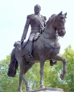 General Espartero Monument showing a bronze equestrian statue of a military figure on a horse atop a stone pedestal.