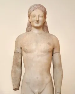 Kouros marble statue of a standing nude male figure with braided hair, an archaic smile, and a missing left forearm.