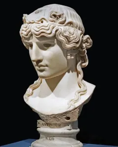 Antinous Mondragone marble bust with wavy hair on a pedestal labeled Antinous and N°126.
