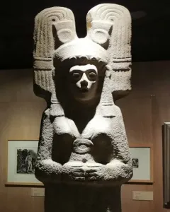 The Young Woman of Amajac statue with an ornate headdress and carved garment details.