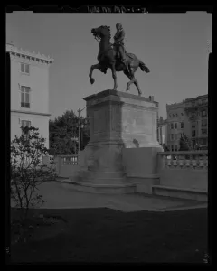 Lafayette Monument with an equestrian statue on a stone pedestal in a paved public space.