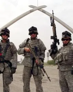 The Victory Arch in Baghdad, two giant crossed swords held by sculpted arms.
