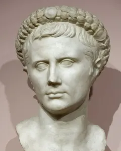White marble bust of Augustus wearing a gemmed crown.