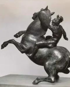 Rearing Horse and Mounted Warrior statuette showing a rearing horse with a mounted warrior on a rectangular base.