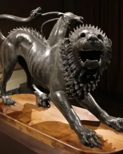 Bronze Chimera of Arezzo with a lion’s body, a goat’s head on its back, and a raised snake tail.