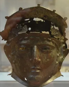 Corroded Ribchester Helmet with a sculpted face mask and damaged open crown