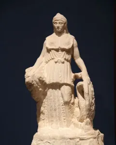 Lenormant Athena, a marble statue of a helmeted draped female figure holding a rounded object and a coiled serpent-like form