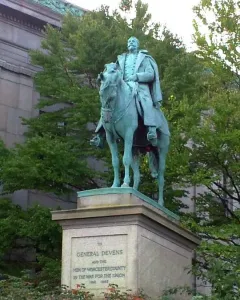 Charles Devens statue, a green-patinaed equestrian monument of a uniformed man on horseback with an inscription on the stone pedestal.