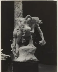 Emmanuel Frémiet\'s Gorilla Carries a Woman sculpture shows an ape-like figure carrying a nude woman over its shoulder.