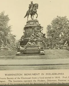 Washington Monument with a large equestrian statue and tiered sculptural figures at the top.