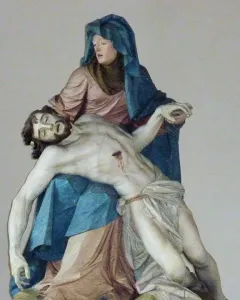 Nenningen Pietà showing a robed woman cradling the lifeless body of a bearded man across her lap.