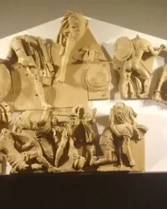Talamone Pediment terracotta relief with warriors, horses, and chariot scenes