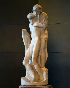 The Rondanini Pietà, a tall unfinished marble sculpture of two intertwined figures on a stone pedestal.