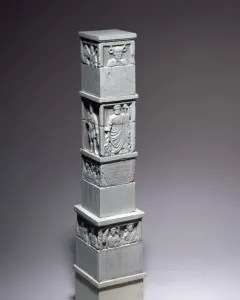 The Nautae Parisiaci Pillar, a tall stone monument with stacked carved blocks and relief figures.