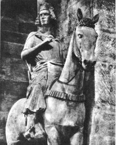 The Bamberg Horseman stone statue shows a crowned rider on a horse, facing left.