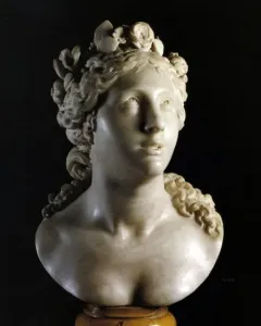 Blessed Soul marble bust of a woman with an upward gaze and curled hair