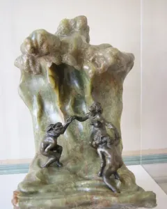 The Wave by Camille Claudel, with three nude bathers integrated into a cresting stone wave.