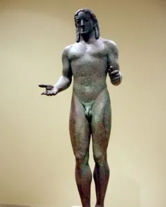 Piraeus Apollo bronze statue of a nude male figure with long hair and outstretched arms