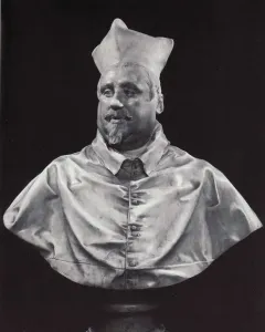 Marble bust of Cardinal Scipione Borghese wearing a clerical cap and buttoned robes.