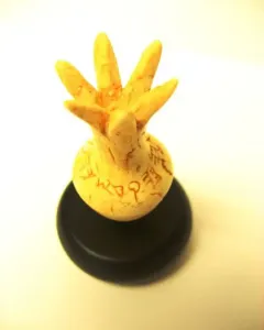 Ivory Pomegranate reconstruction with an inscription around its rounded body