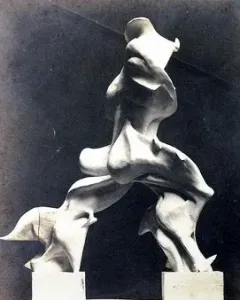 Unique Forms of Continuity in Space, a light-colored abstract sculpture in dynamic forward motion