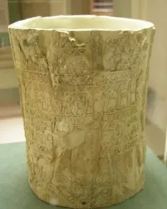 The Situla of the Pania, a pale cylindrical vessel with bands of relief carvings and visible wear.