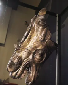 Waldgirmes horse head bronze sculpture with an open mouth and a medallion on the bridle