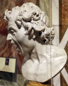 Damned Soul marble bust with a screaming face and furrowed brow
