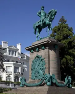 The equestrian bronze statue of Major General George B. McClellan on a tall stone pedestal, with military reliefs at the base.