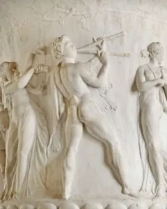 Borghese Vase relief with a satyr playing a double flute between two draped women