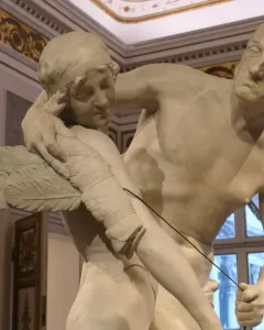 Daedalus and Icarus marble sculpture by Antonio Canova, showing an older man fitting wings onto a younger man.