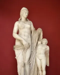 Venus Felix marble statue with a draped female figure and a small winged child figure beside her.