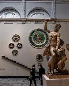 Samson Slaying a Philistine marble sculpture showing two muscular figures in a dramatic struggle, with one raising a weapon over the other.