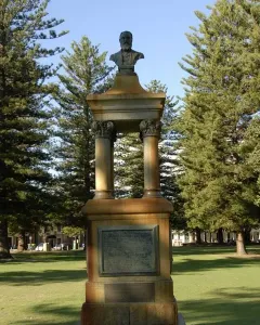 Maitland Brown Memorial stone monument with plaques, a canopy on columns, and a bronze bust on top.