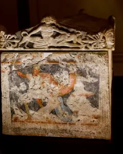 Amazon Sarcophagus with a sculpted lid and faded painted figures on the sarcophagus body