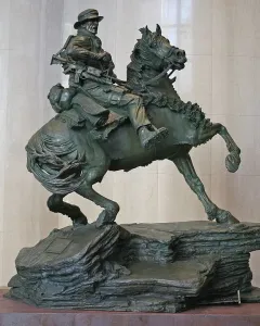 America\'s Response Monument bronze horse soldier statue on a rock-like base
