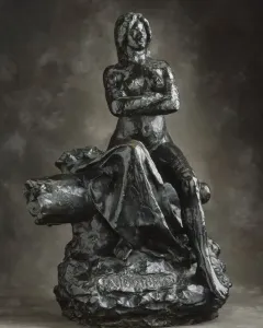 The Resistance sculpture of a nude woman seated with crossed arms and an upward gaze.